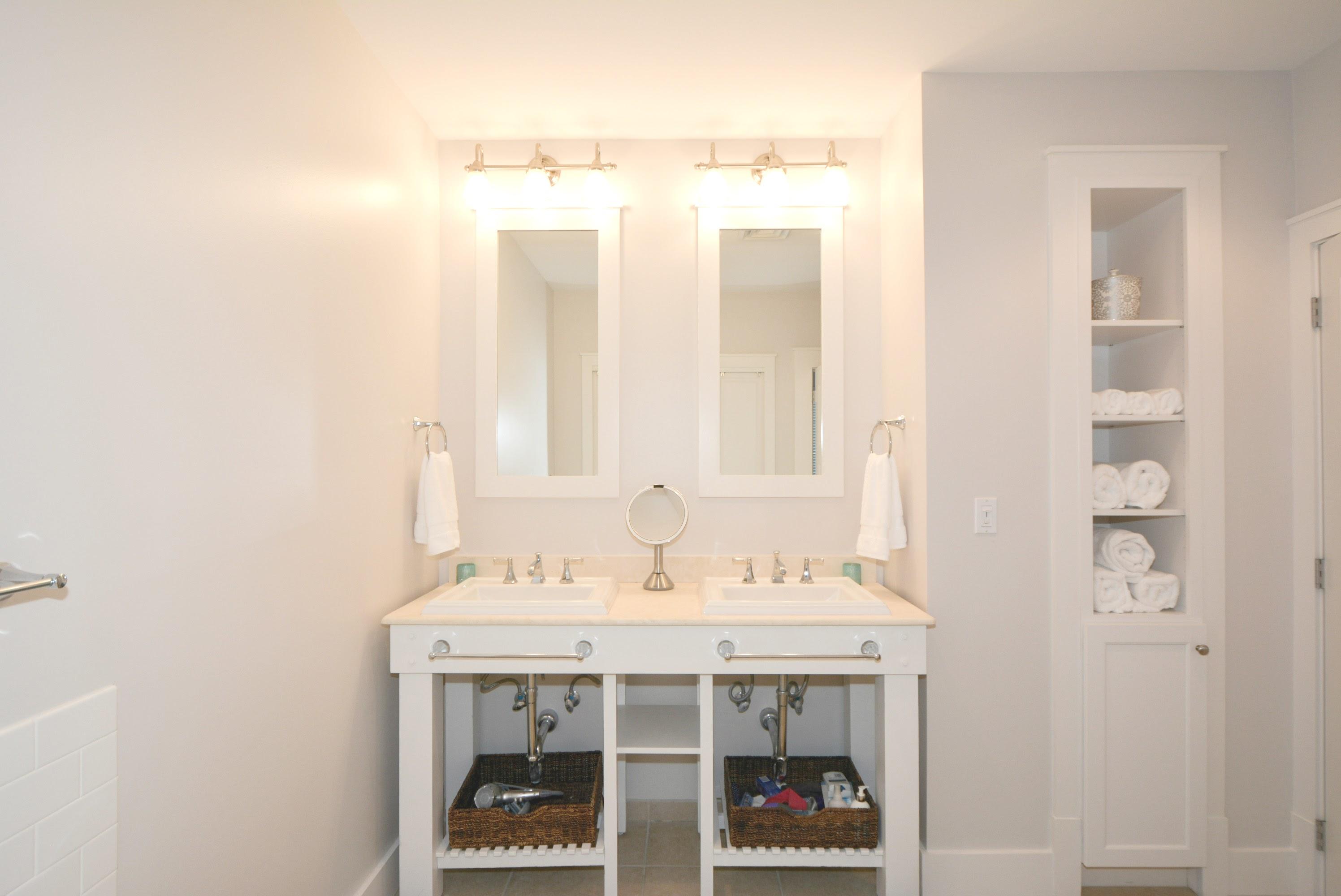 99 Compass Point Way South, Unit 201 Inlet Beach, FL 32461 - Photo 27 of 56 a bathroom with a sink and a mirror