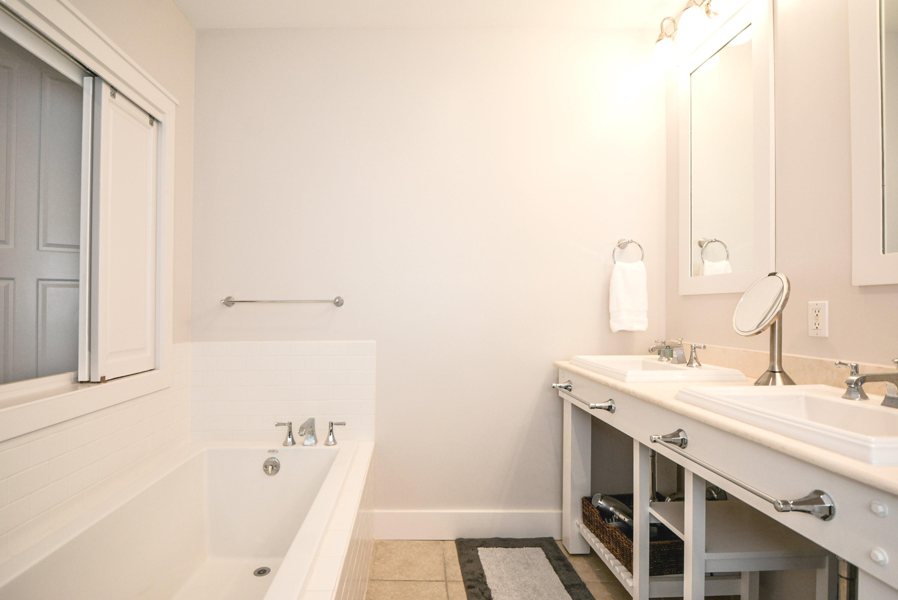99 Compass Point Way South, Unit 201 Inlet Beach, FL 32461 - Photo 30 of 56 a bathroom with a sink and a bathtub
