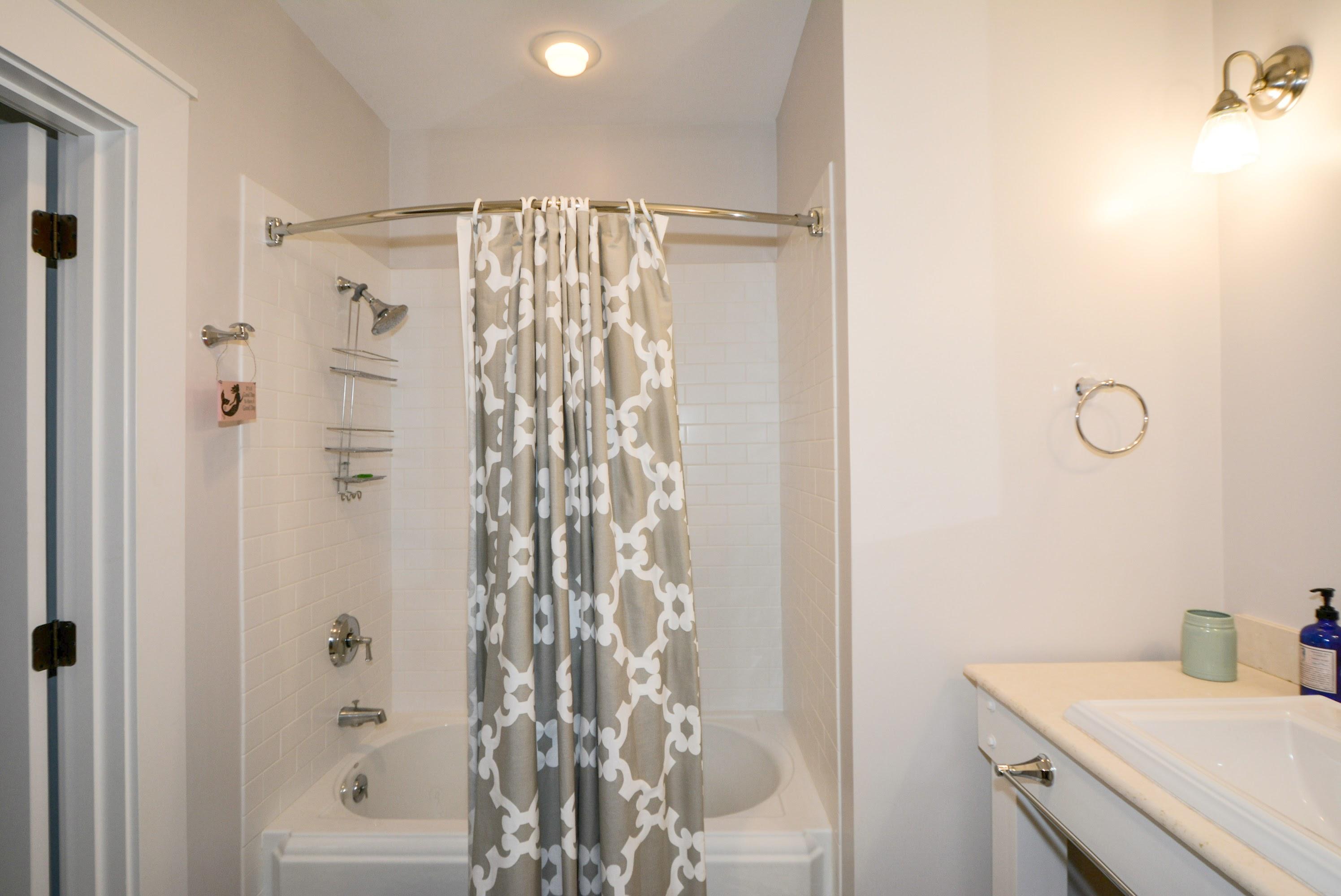 99 Compass Point Way South, Unit 201 Inlet Beach, FL 32461 - Photo 36 of 56 a bathroom with a shower curtain and a sink