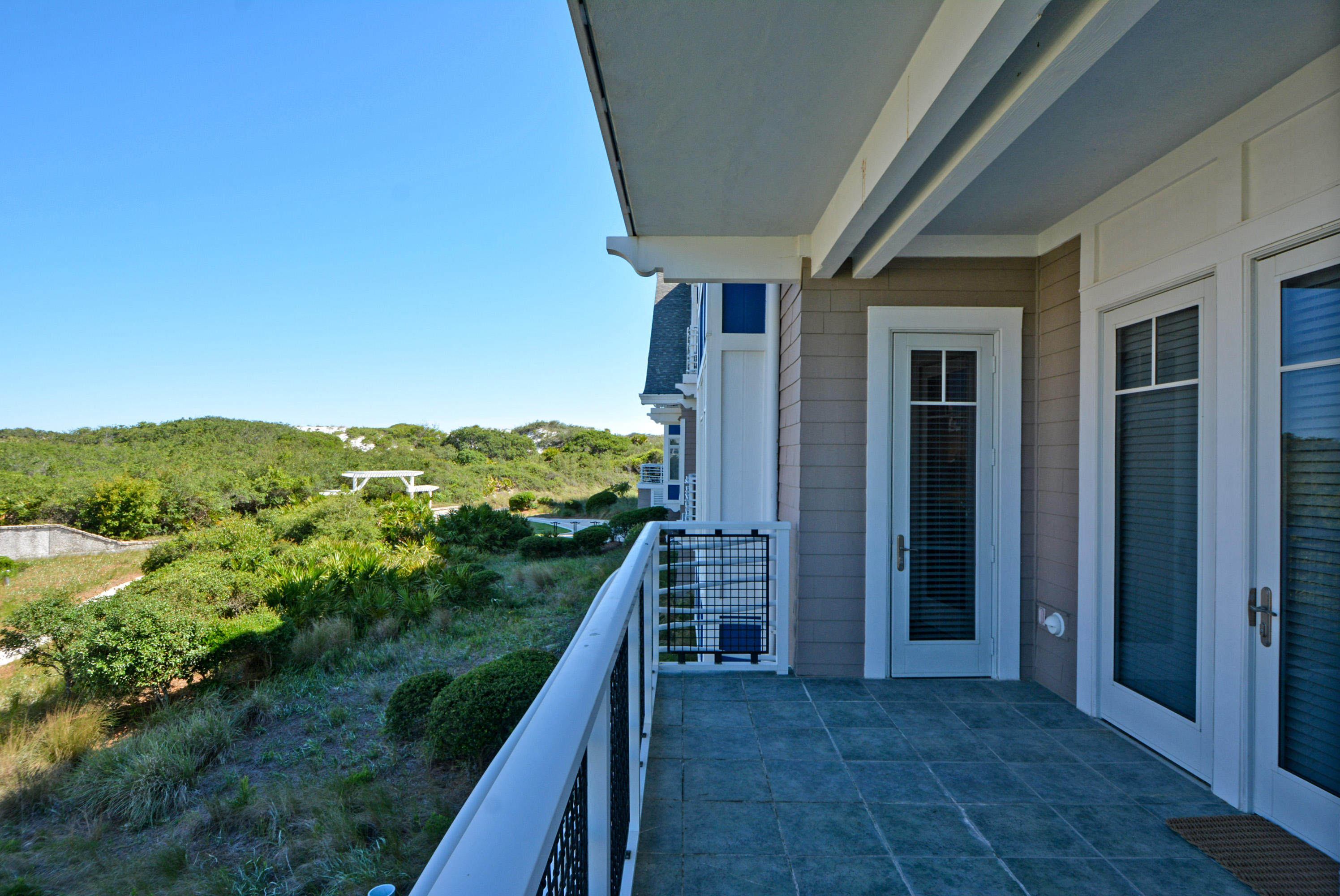 99 Compass Point Way South, Unit 201 Inlet Beach, FL 32461 - Photo 38 of 56 a view of a balcony with an ocean view