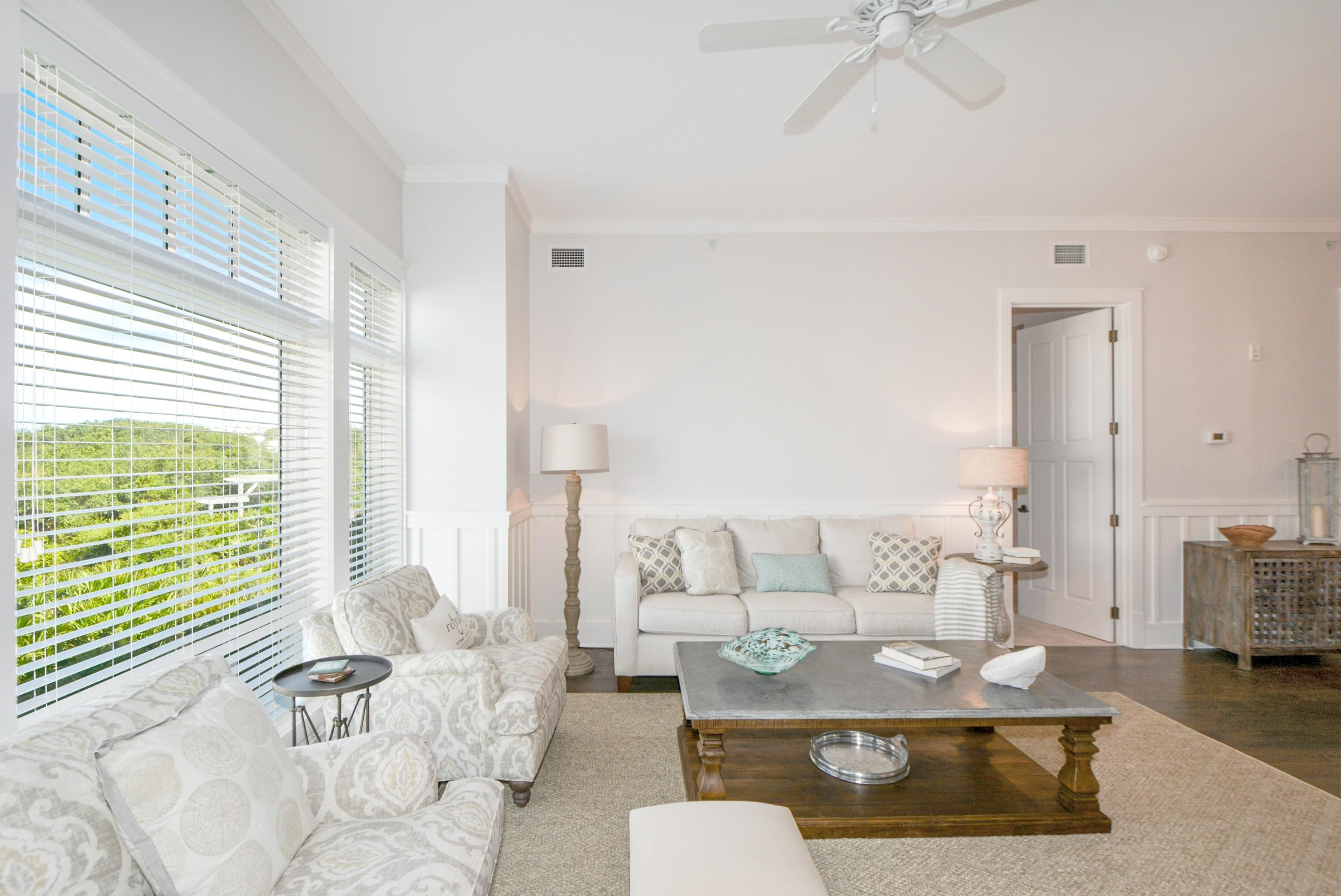 99 Compass Point Way South, Unit 201 Inlet Beach, FL 32461 - Photo 10 of 56 a living room with furniture and wooden floor