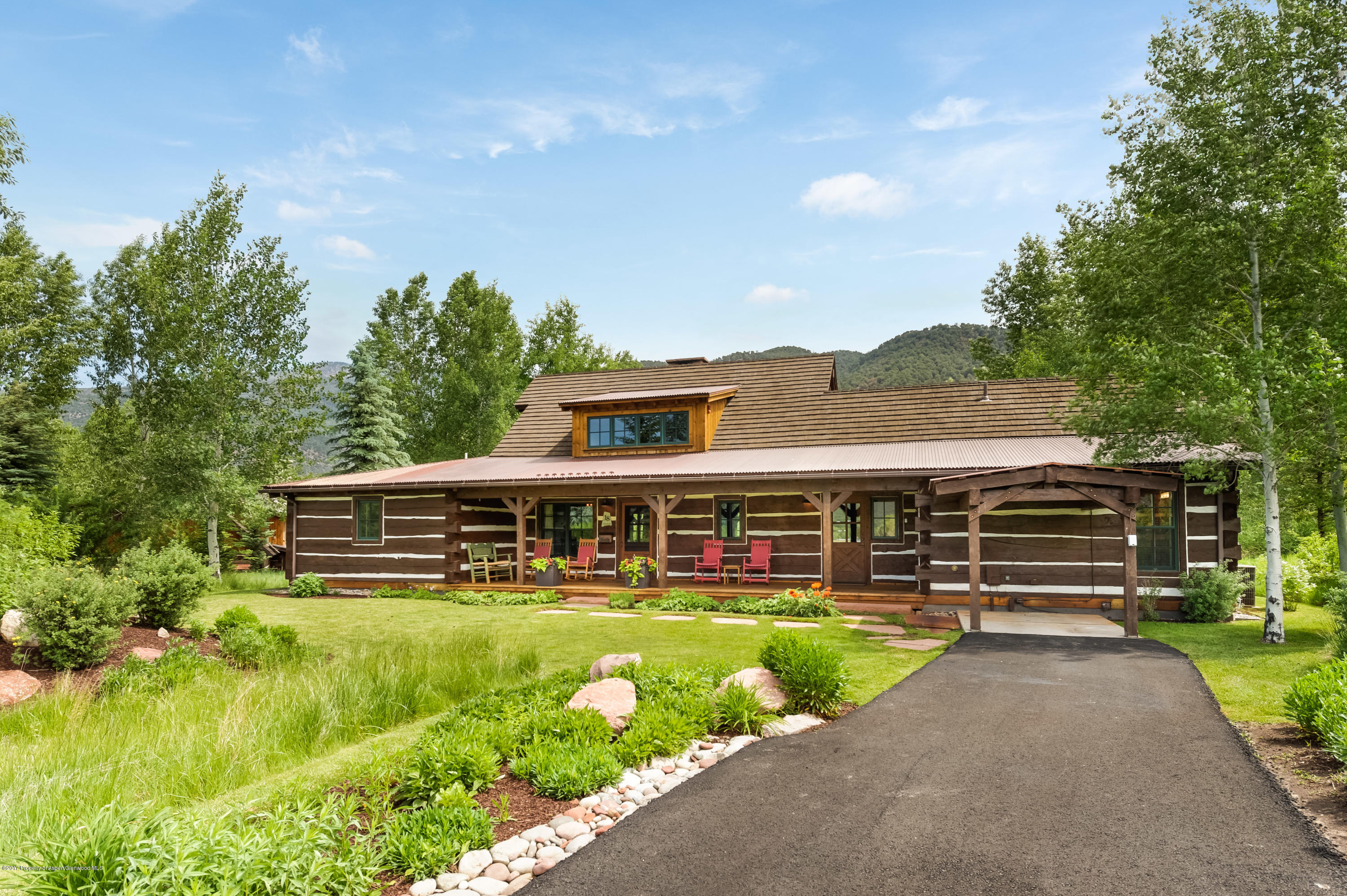 18 Arbaney Ranch Road, Unit CABIN 18 Basalt, CO 81621 - Photo 1 of 1 a view of a house with a yard
