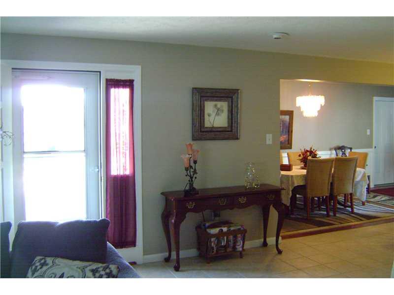 959 Harper Road Crescent, PA 15046 - Photo 12 of 24 Dining Room. View front living room into dining room shows the open floor plan from the entry door.