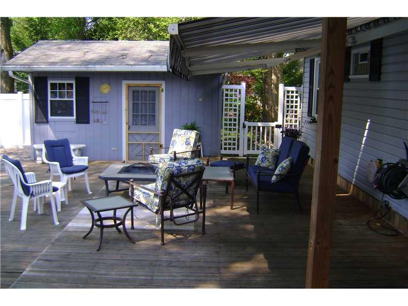 959 Harper Road Crescent, PA 15046 - Photo 6 of 24 Patio/Deck. Convenient storage shed painted to match the house.