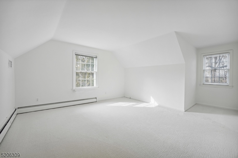 37 Evergreen Road Summit, NJ 07901 - Photo 18 of 28 an empty room with windows and closet