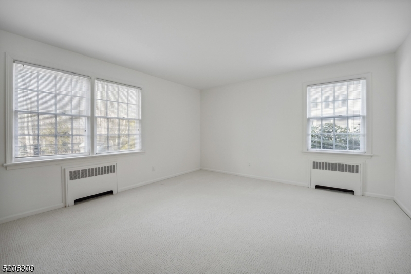 37 Evergreen Road Summit, NJ 07901 - Photo 10 of 28 an empty room with a window