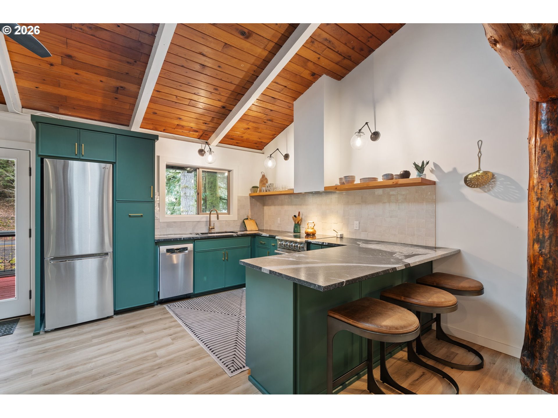 110 Wooden Bridge Road Kalama, WA 98625 - Photo 14 of 48 a kitchen with stainless steel appliances granite countertop a sink and cabinets