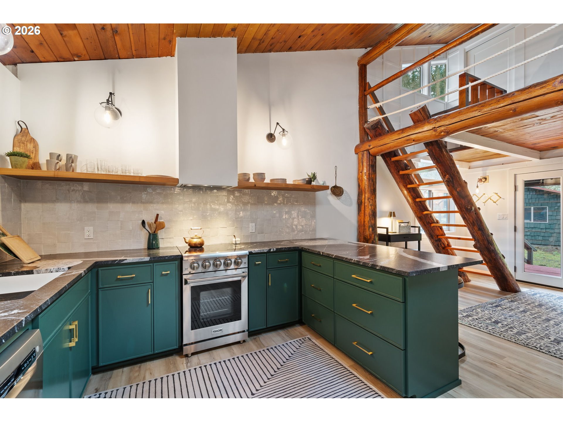 110 Wooden Bridge Road Kalama, WA 98625 - Photo 15 of 48 a kitchen with a cabinets and a sink