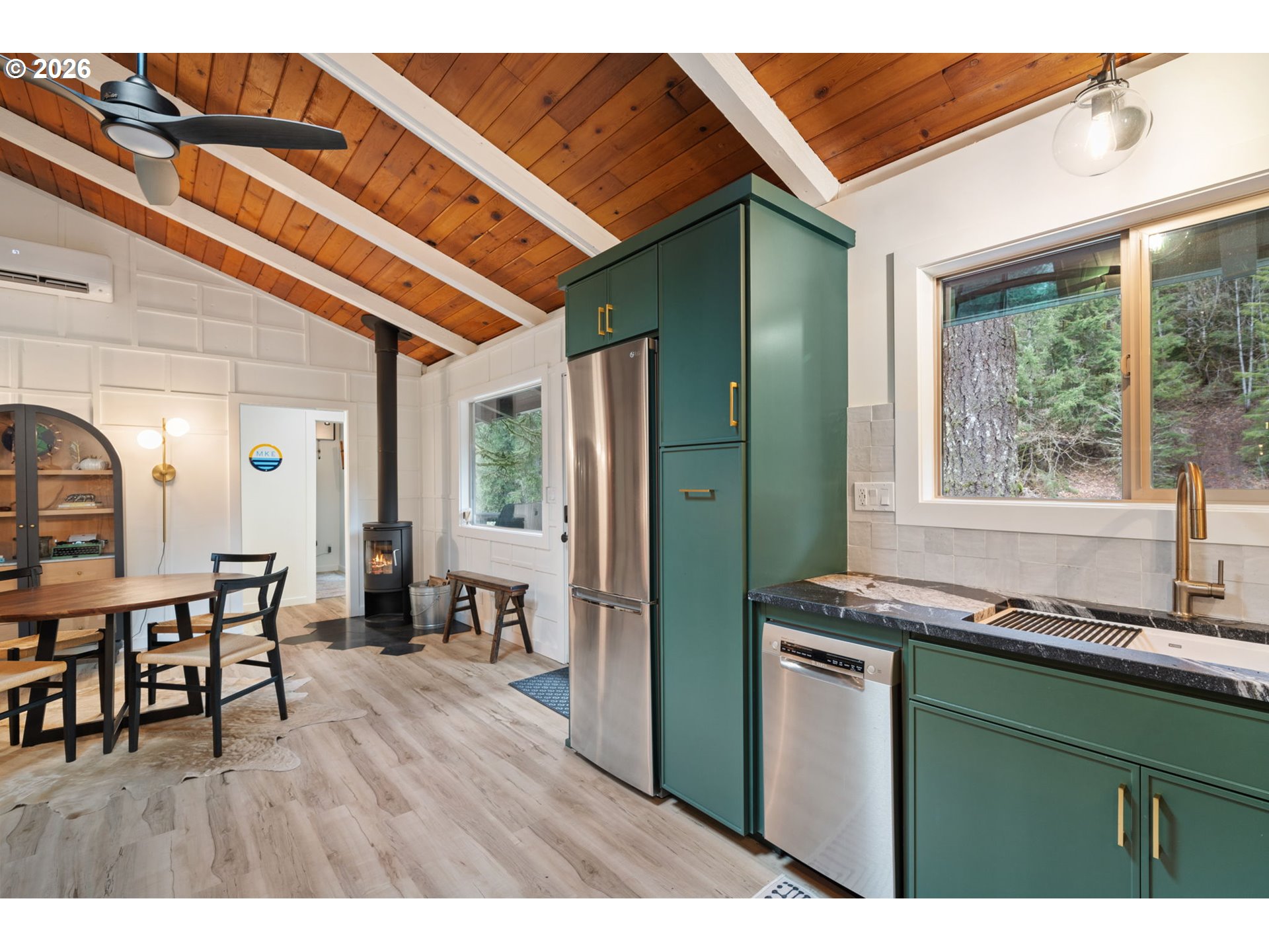 110 Wooden Bridge Road Kalama, WA 98625 - Photo 16 of 48 a kitchen with cabinets and wooden floor