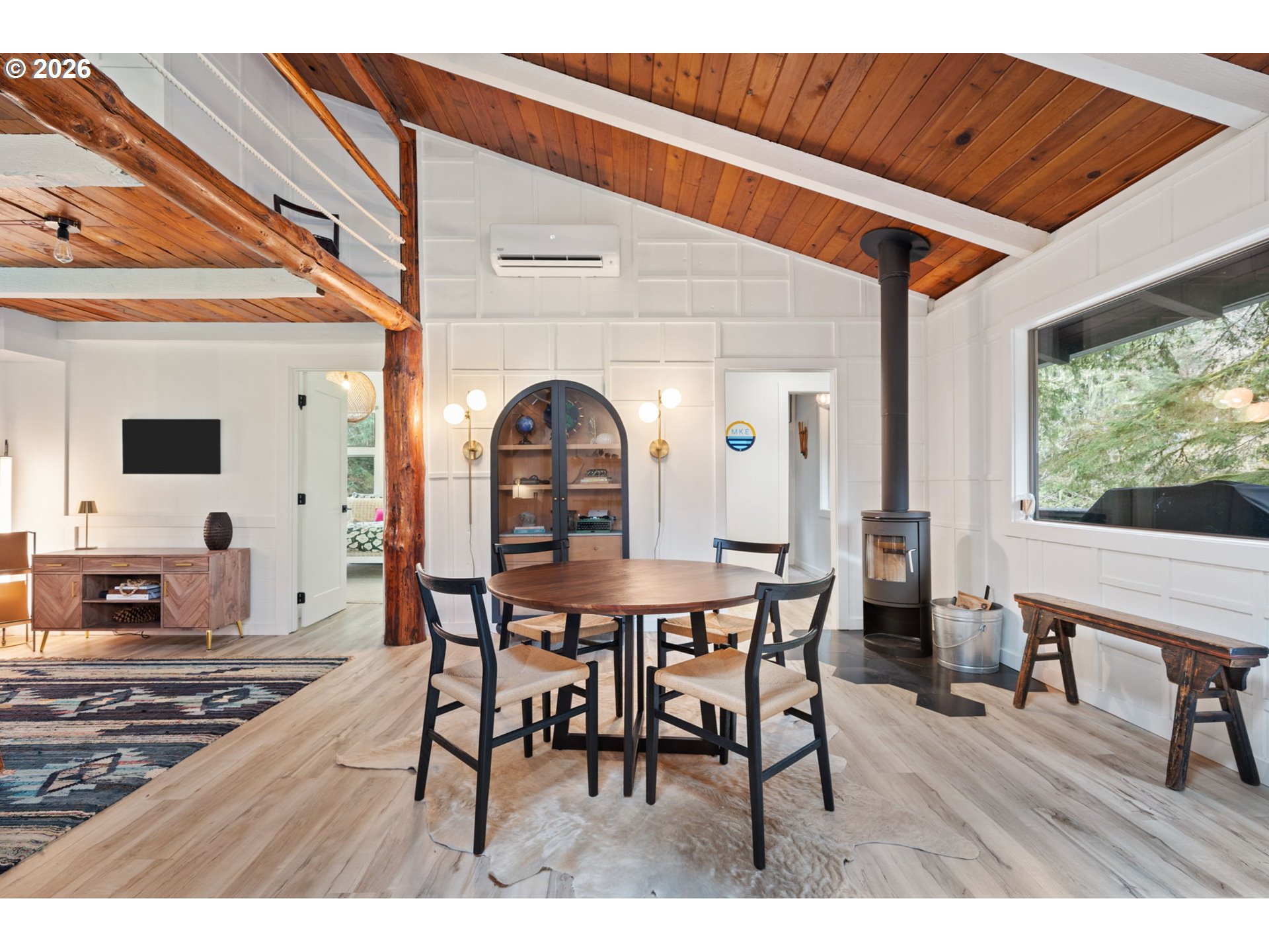 110 Wooden Bridge Road Kalama, WA 98625 - Photo 17 of 48 a view of a dining room with furniture and wooden floor