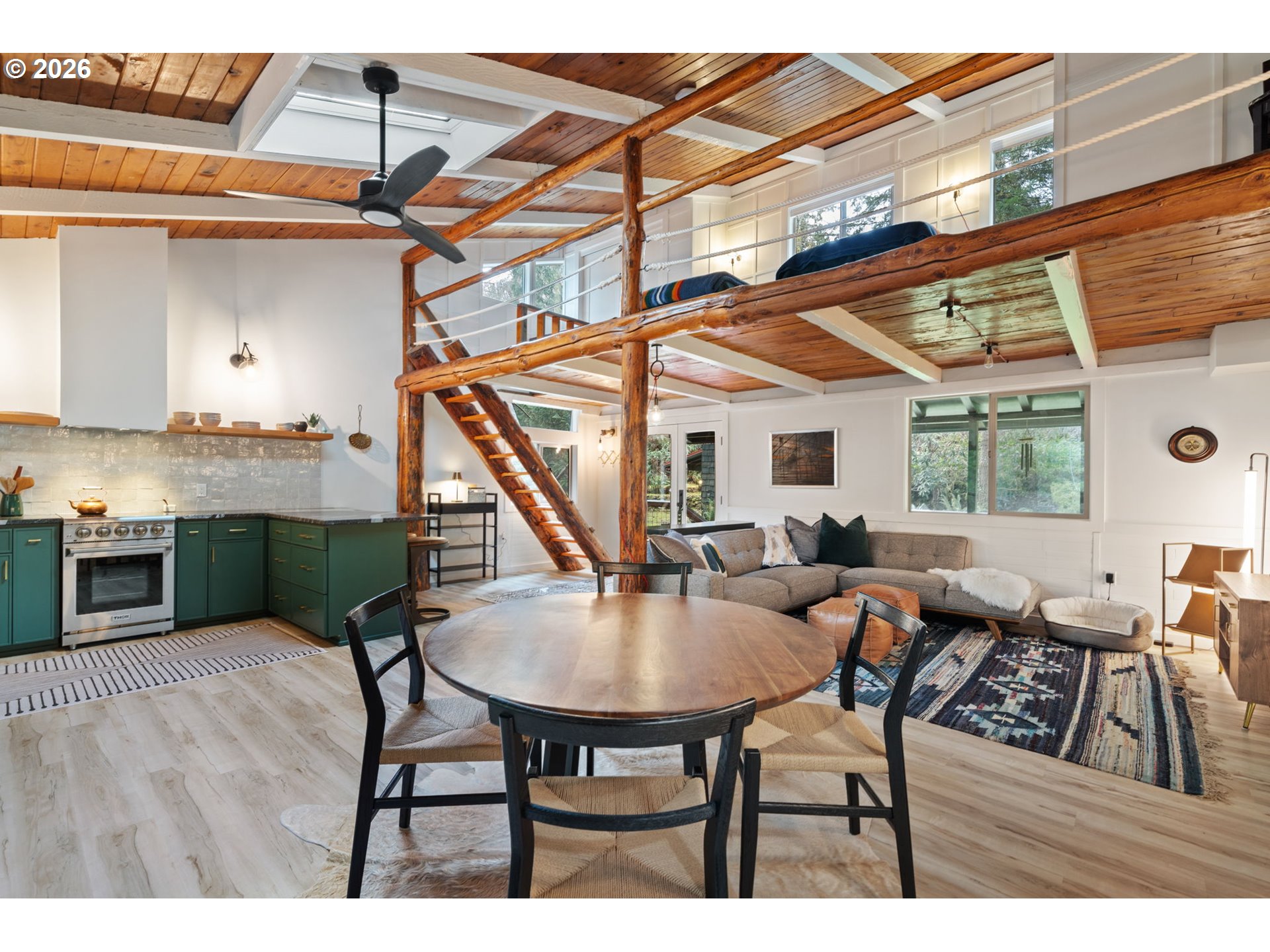 110 Wooden Bridge Road Kalama, WA 98625 - Photo 18 of 48 a dining room with furniture and a floor to ceiling window