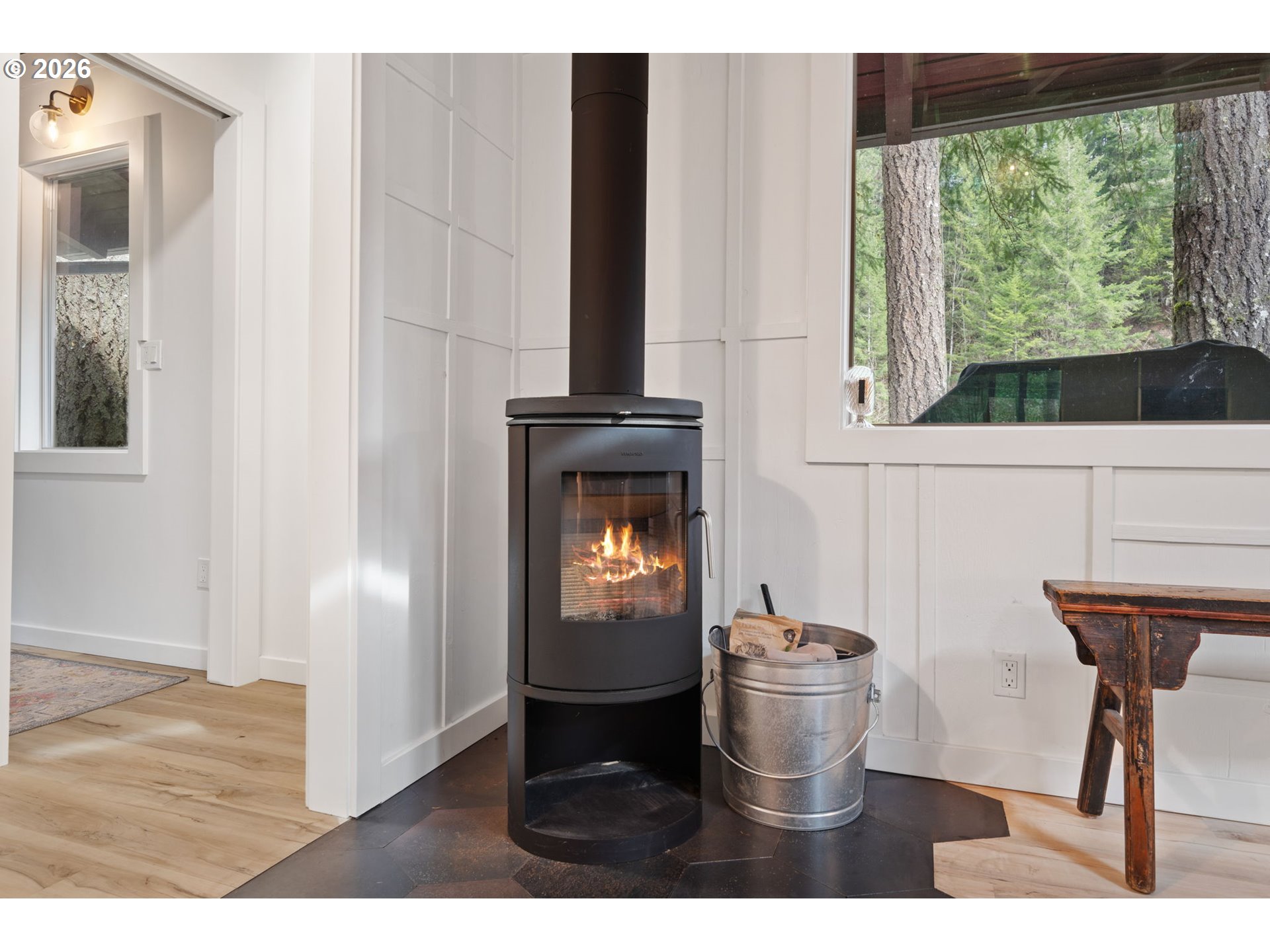 110 Wooden Bridge Road Kalama, WA 98625 - Photo 19 of 48 a kitchen with a refrigerator and a wooden floor
