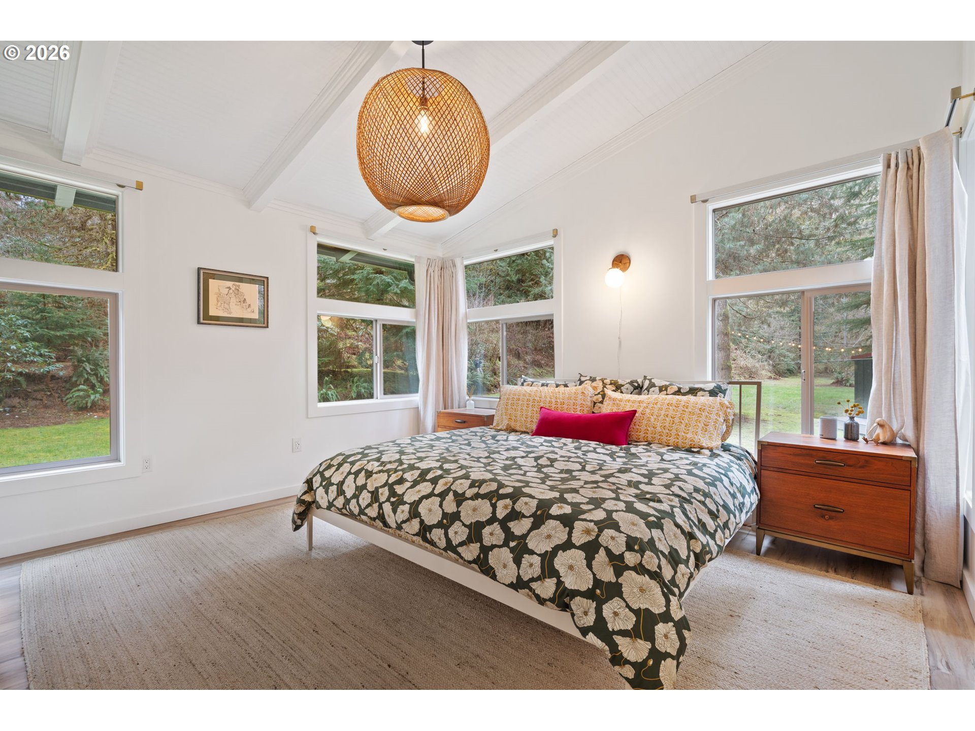 110 Wooden Bridge Road Kalama, WA 98625 - Photo 20 of 48 a bedroom with a large bed and a large window