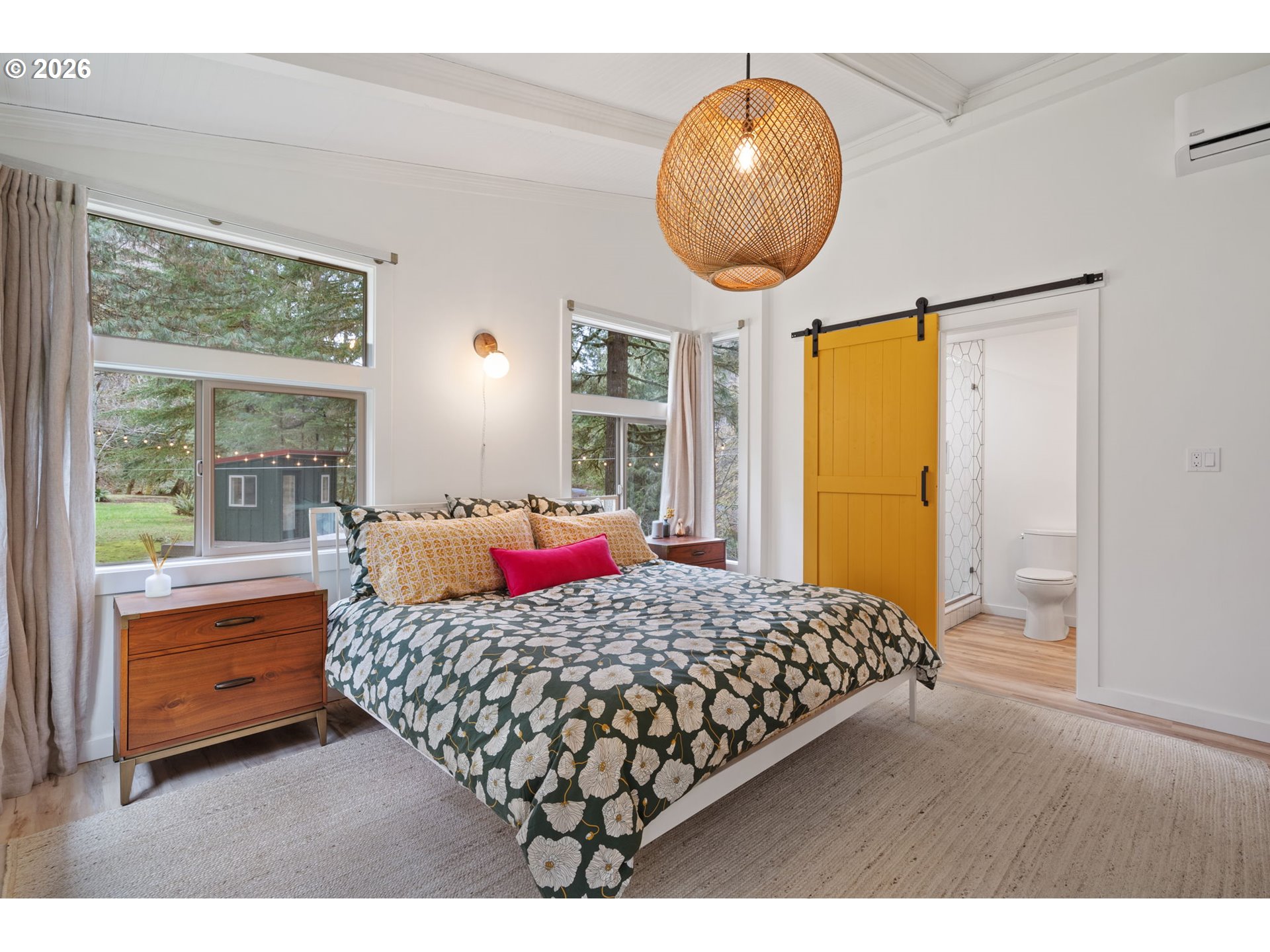 110 Wooden Bridge Road Kalama, WA 98625 - Photo 21 of 48 a bedroom with a large bed and wooden floor