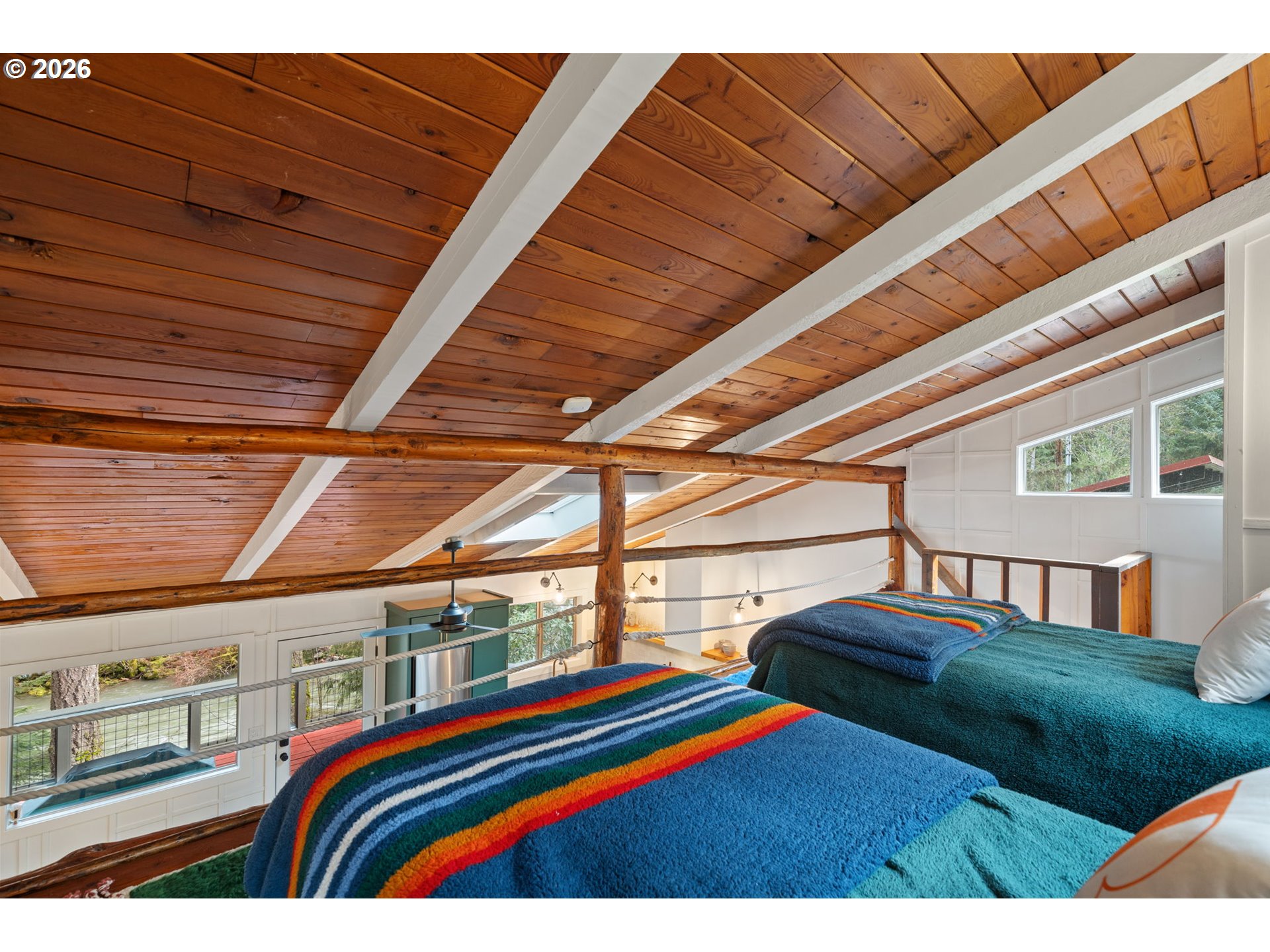 110 Wooden Bridge Road Kalama, WA 98625 - Photo 26 of 48 a bedroom with a bed next to a window