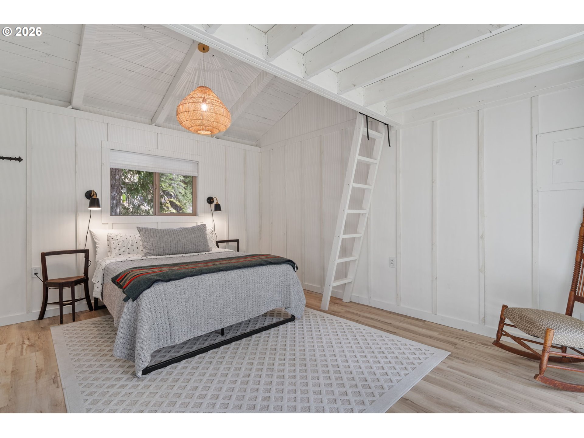 110 Wooden Bridge Road Kalama, WA 98625 - Photo 30 of 48 a bedroom with a bed window and a table