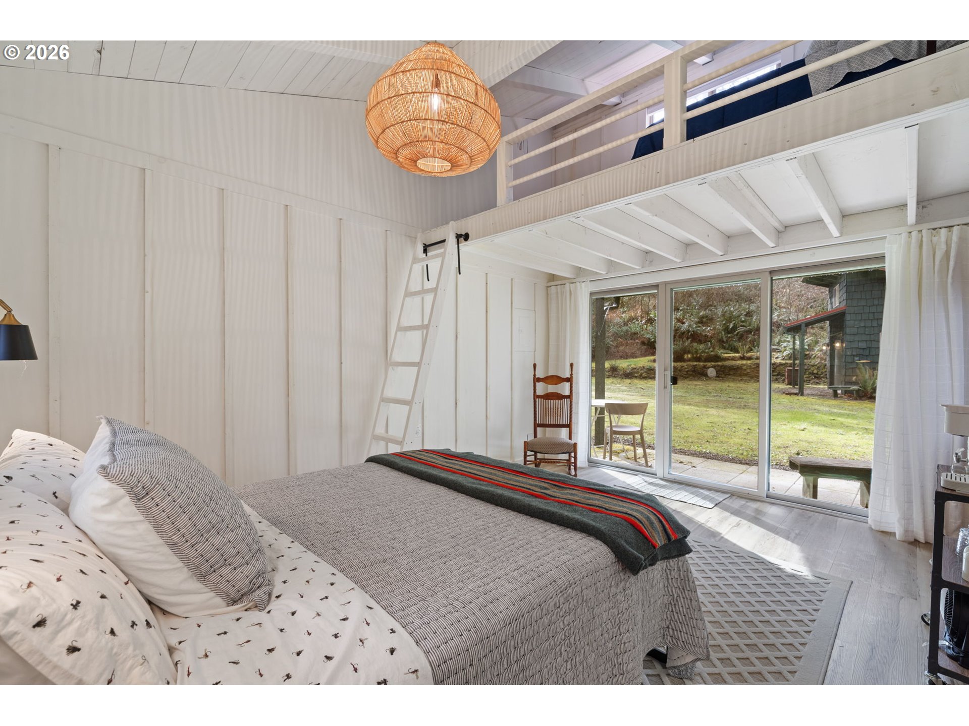 110 Wooden Bridge Road Kalama, WA 98625 - Photo 31 of 48 a bed sitting in a bedroom next to a window