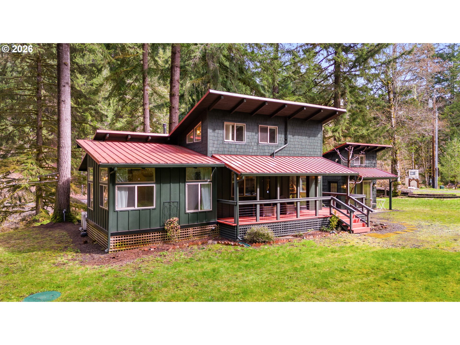110 Wooden Bridge Road Kalama, WA 98625 - Photo 4 of 48 a view of a house with a backyard porch and sitting area