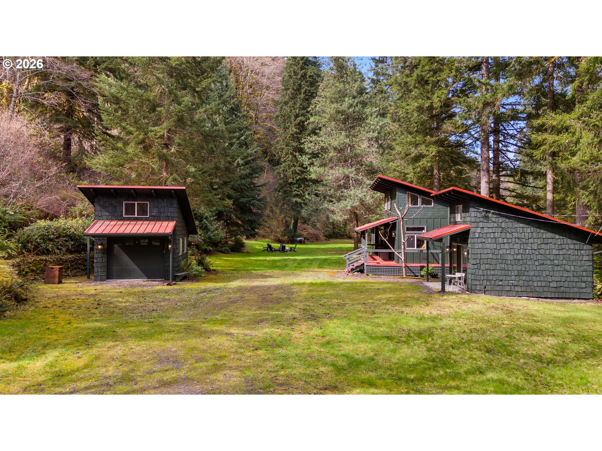 110 Wooden Bridge Road Kalama, WA 98625 - Photo 43 of 48 a view of a house with a swimming pool