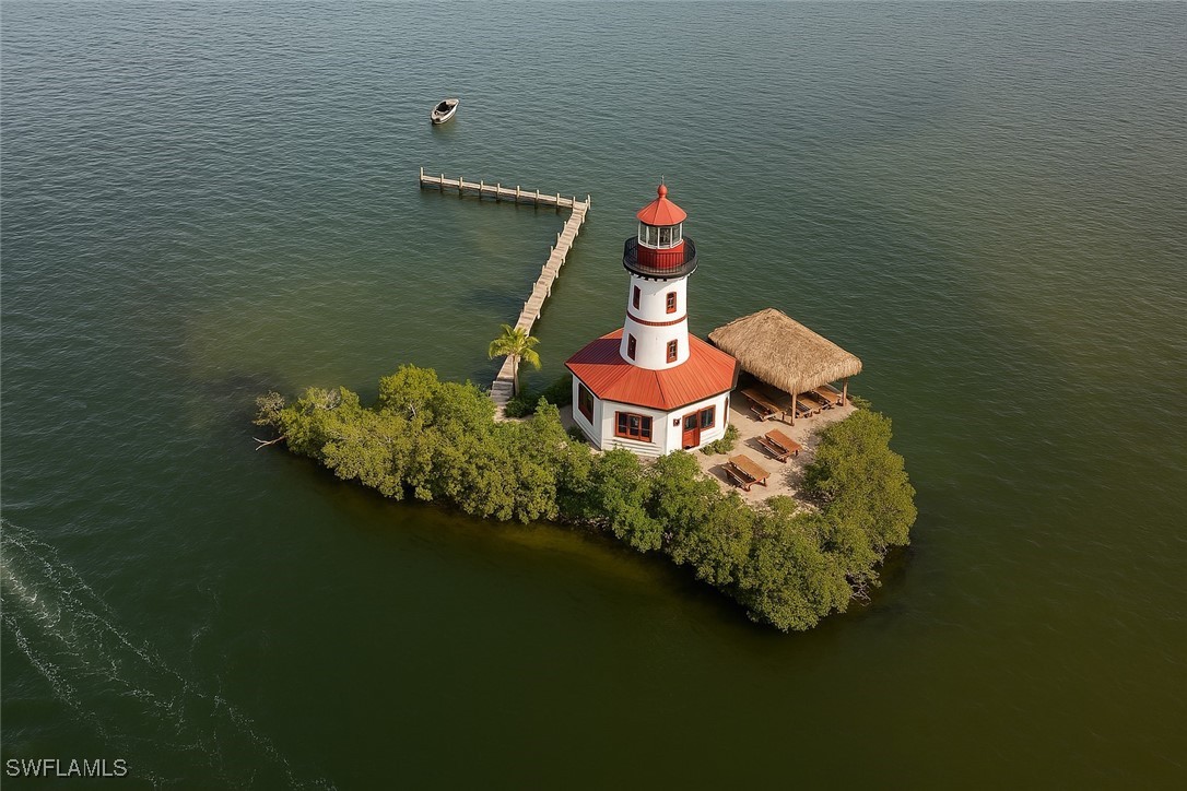 Little Shell Island Fort Myers, FL 33908 - Photo 23 of 26 a view of a house with pool
