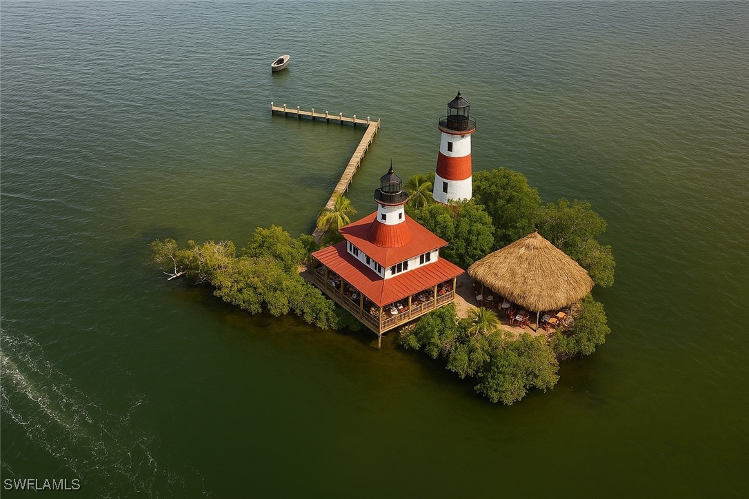 Little Shell Island Fort Myers, FL 33908 - Photo 26 of 26 swimming pool with trees in the background