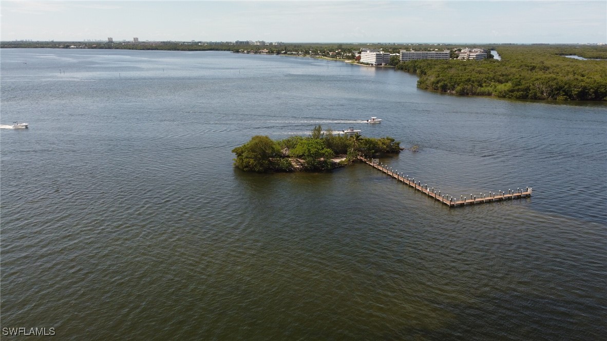 Little Shell Island Fort Myers, FL 33908 - Photo 9 of 26 a view of a lake with outdoor space