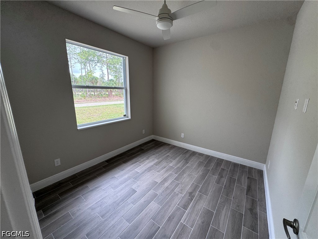 915 Marconi Loop LaBelle, FL 33935 - Photo 5 of 6 an empty room with windows