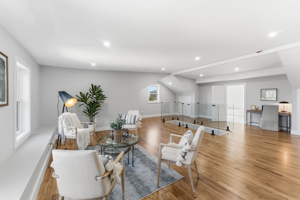143 Hunting Road Needham, MA 02494 - Photo 36 of 42 a view of a dining room with furniture and wooden floor