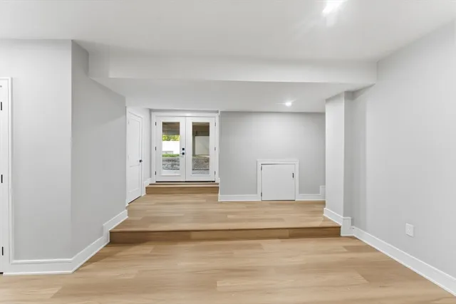 a bathroom with a sink and mirror