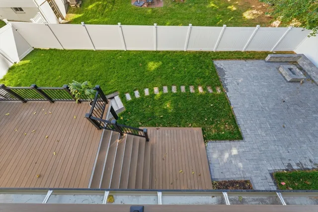 a view of house with backyard