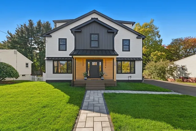 a front view of a house with yard