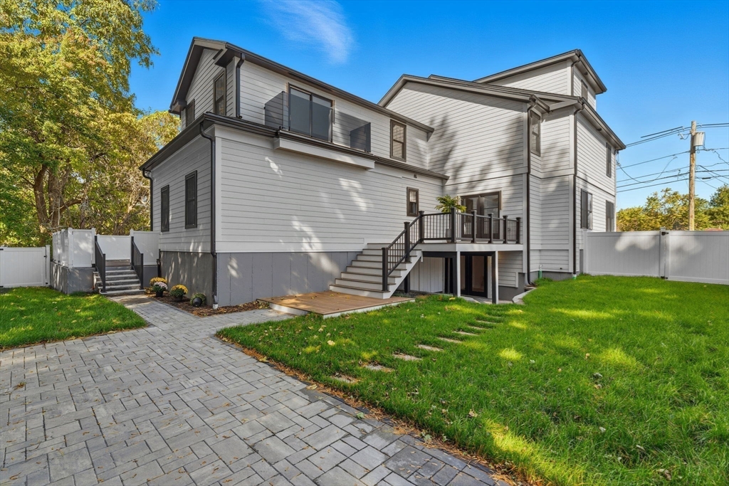 143 Hunting Road Needham, MA 02494 - Photo 41 of 42 a view of house with backyard