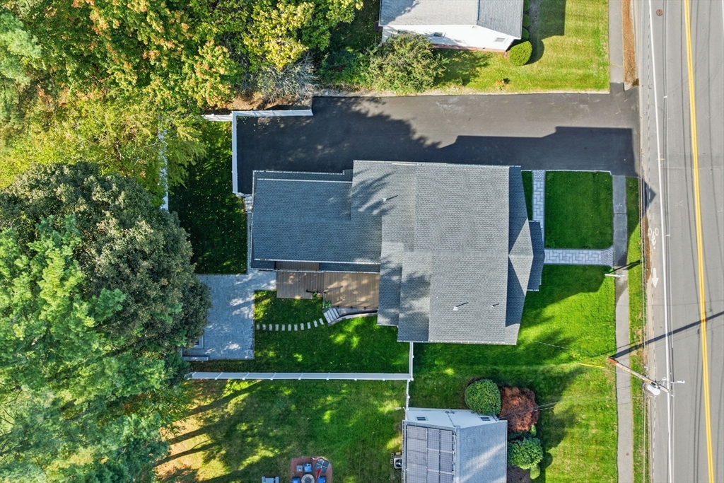 143 Hunting Road Needham, MA 02494 - Photo 5 of 42 an aerial view of a house with a yard