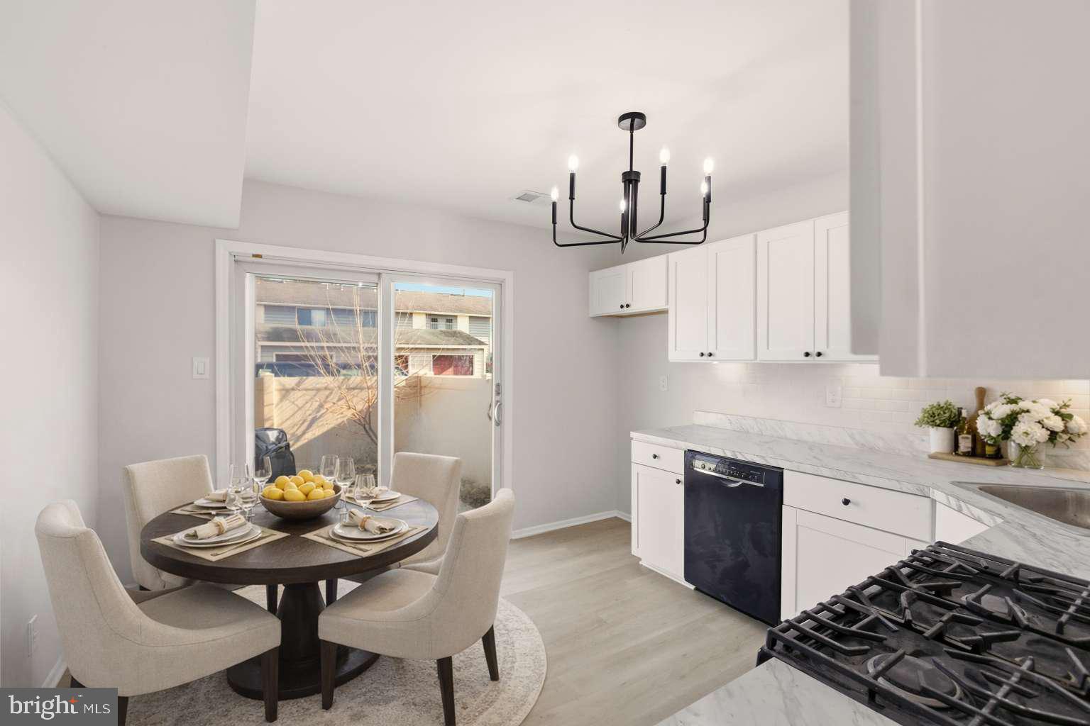 804 Mason Run Pine Hill, NJ 08021 - Photo 2 of 15 a kitchen with stainless steel appliances a sink a stove and a table