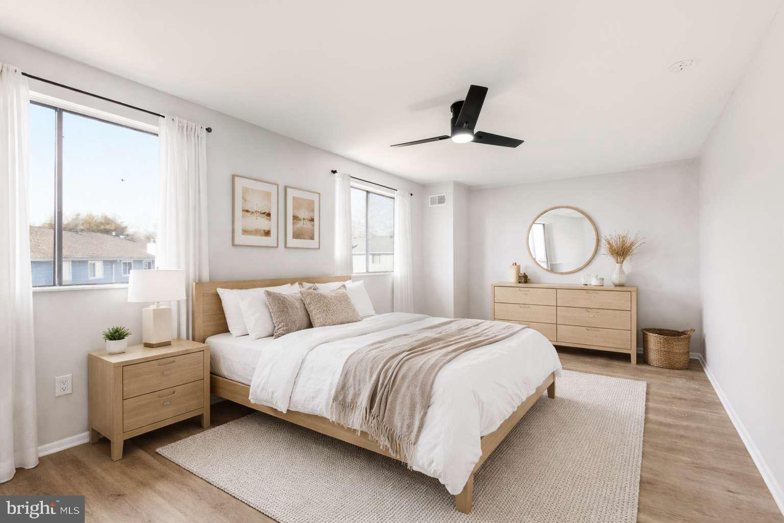 804 Mason Run Pine Hill, NJ 08021 - Photo 4 of 15 a bedroom with a bed a large window and mirror