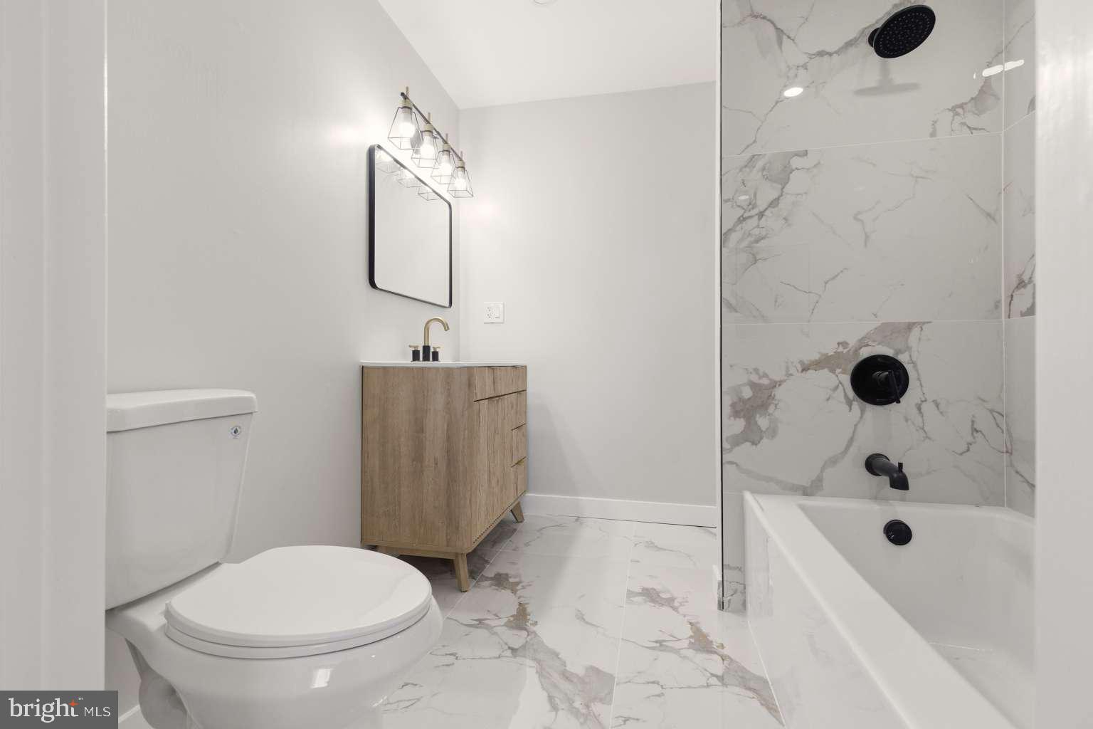 804 Mason Run Pine Hill, NJ 08021 - Photo 5 of 15 a bathroom with a toilet a sink a vanity and shower
