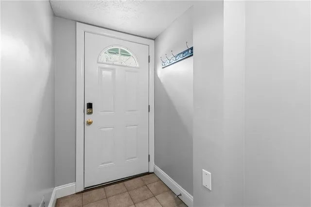 a view of a hallway with closet
