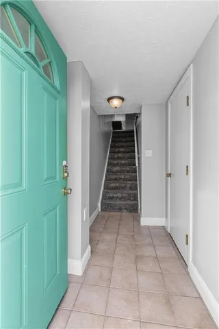 a view of an entryway with staircase