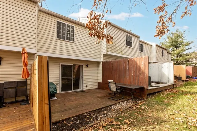 a view of a house with backyard