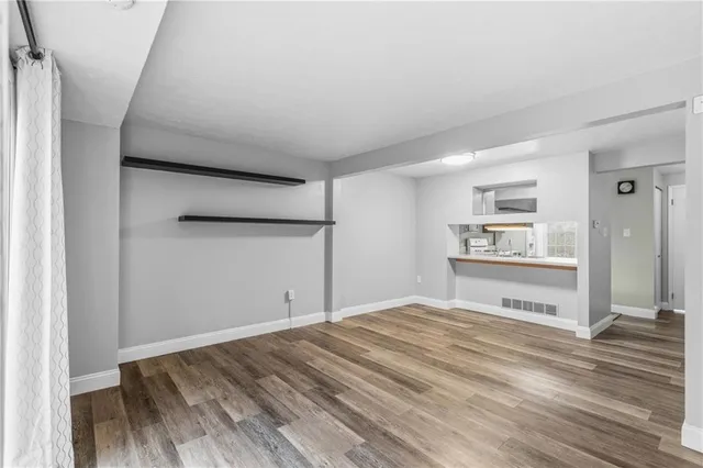 a view of kitchen with wooden floor