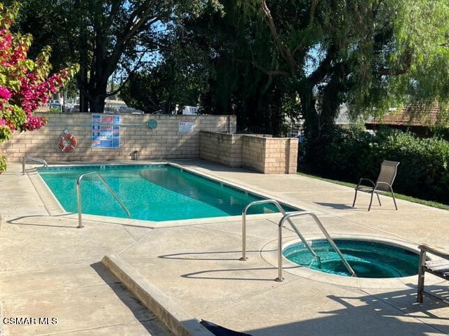 279 North Skyline Drive Thousand Oaks, CA 91362 - Photo 23 of 24 a view of a swimming pool with a patio