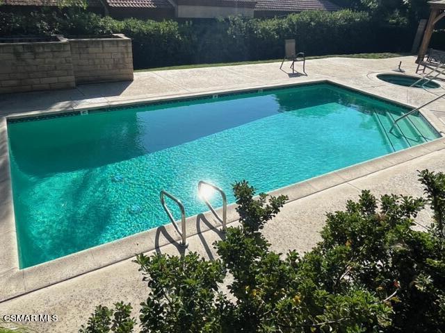 279 North Skyline Drive Thousand Oaks, CA 91362 - Photo 24 of 24 a view of a garden with a bench in the background