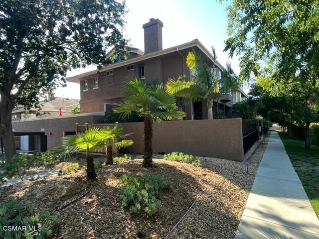 279 North Skyline Drive Thousand Oaks, CA 91362 - Photo 3 of 24 a view of a chair and table in the backyard