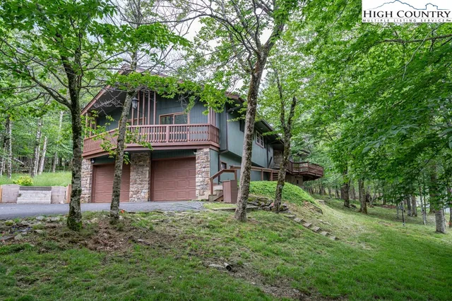 a house view with a backyard space