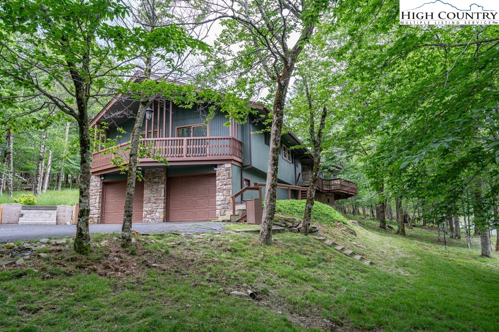 a house view with a backyard space