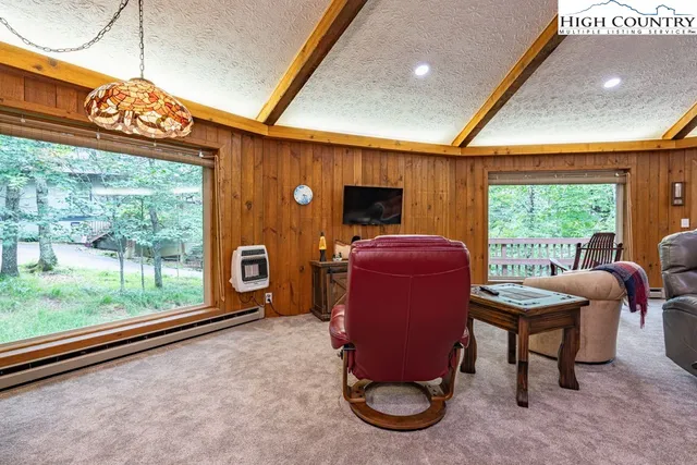 a room with furniture and a window