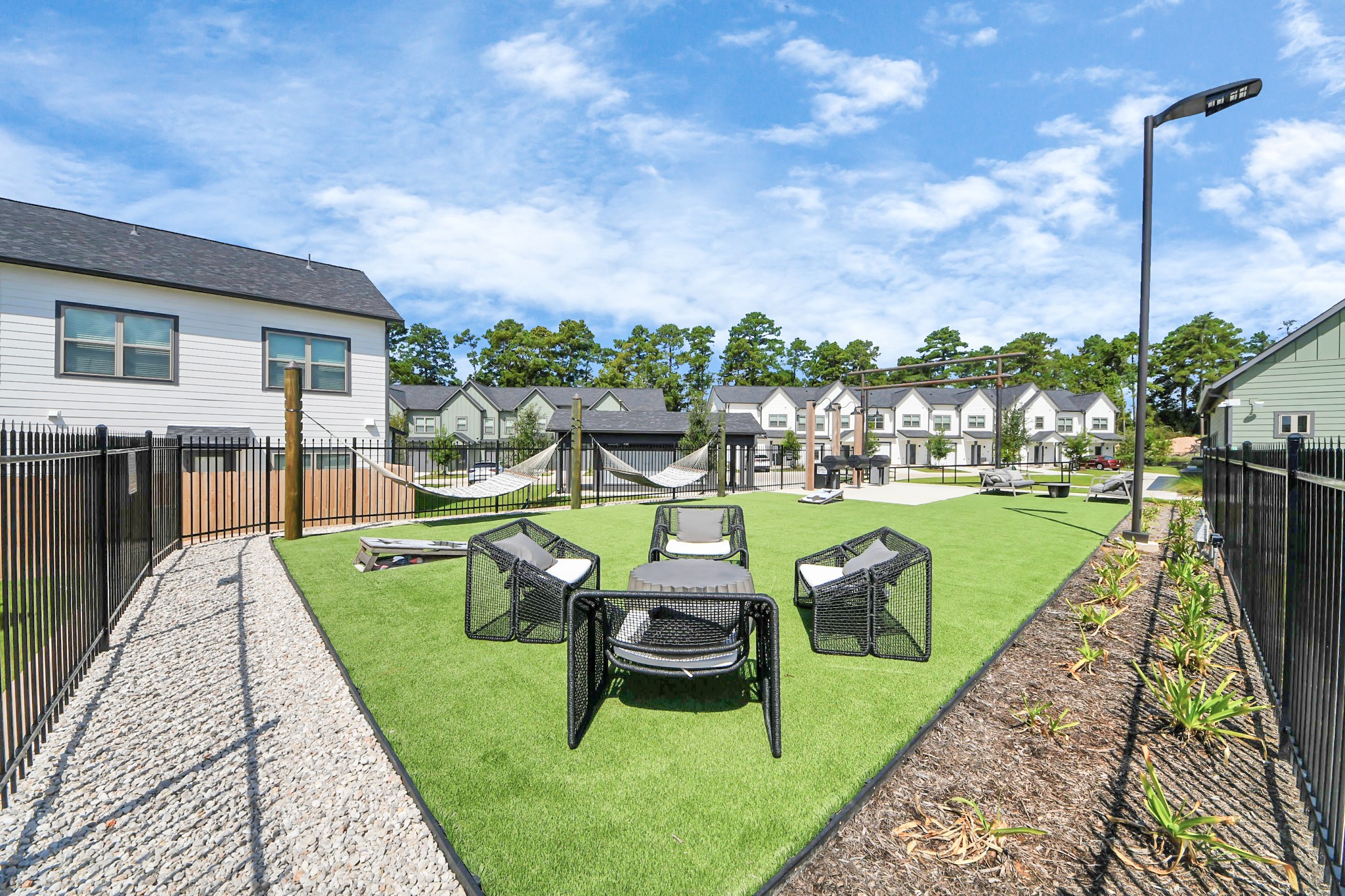 7711 Longmire Road, Unit 58 Conroe, TX 77304 - Photo 23 of 48 Enjoy an abundance of Amenities:Resort-Style Pool w/Sundeck Ledge&Outdoor Lounge Areas w/Grilling area,Gaming Lawn,Pickleball Court,Quaint Dog Park for your fur babies!24/7 Fitness Center w/Kids Play Zone area.Stunning Clubhouse w/Café/Lounge.Playground Area.Electric Vehicle Charging Stations!