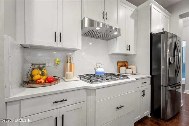 a view of a dining room with furniture