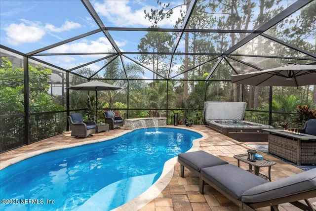 a view of a workspace with furniture