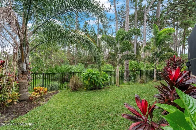 a bathroom with a granite countertop sink mirror and toilet